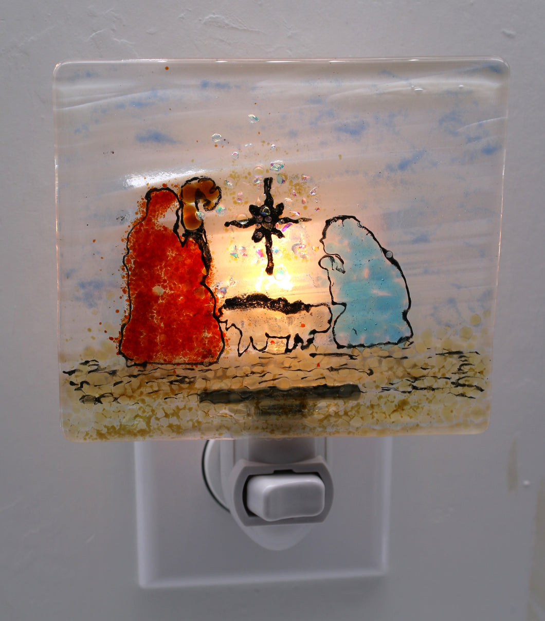 Christmas Nativity Scene on white streaky Glass