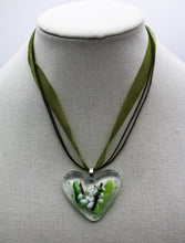 Load image into Gallery viewer, Jewelry - Clear Heart with small pieces of glass depicting a Lilly flowers
