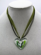 Load image into Gallery viewer, Jewelry - Clear Heart with small pieces of glass depicting a Lilly flowers
