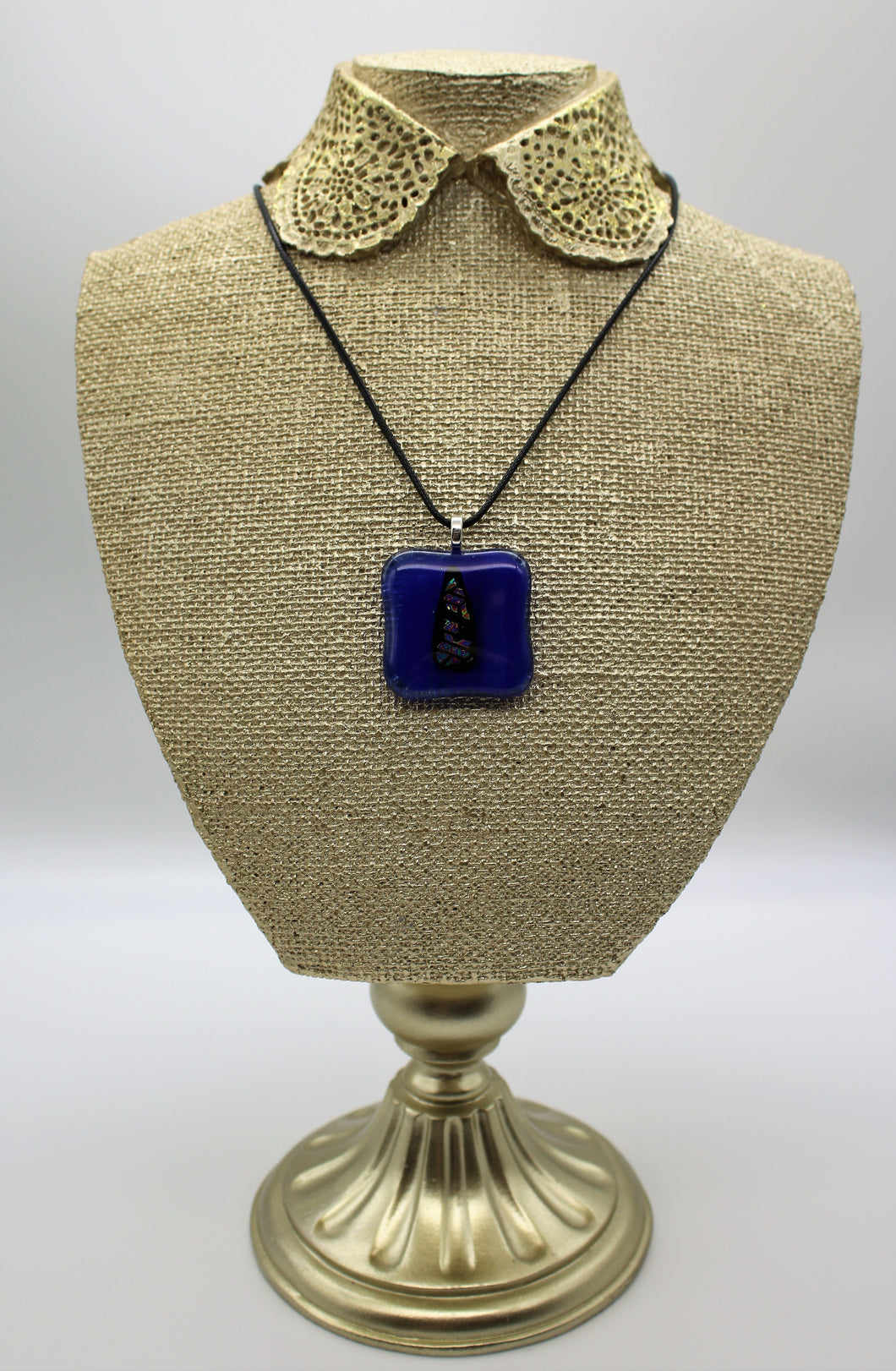 Jewelry - Small Square Transparent Blue with Triangle piece of Dichroic glass on black embedded in Glass pendant