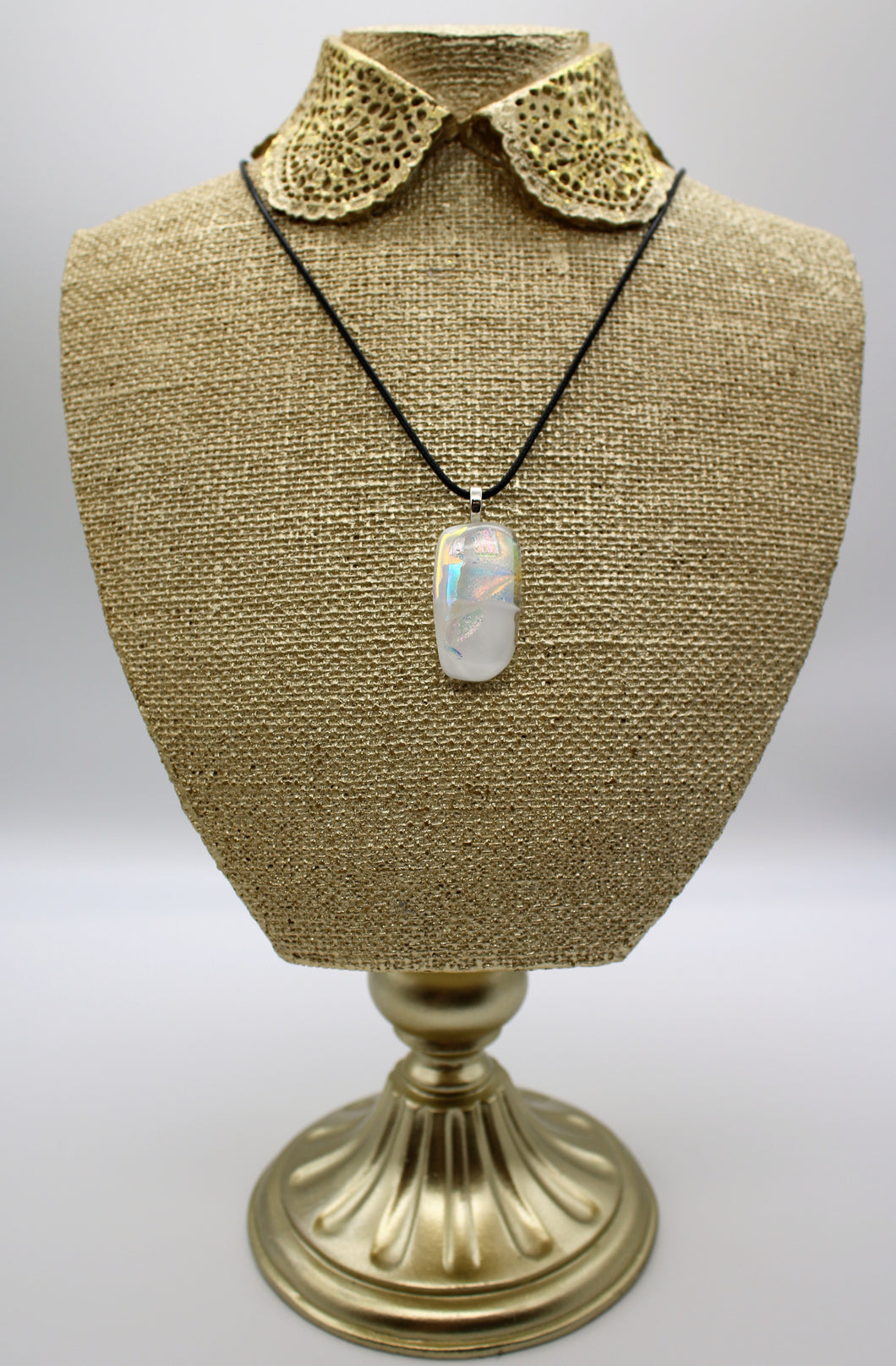 Jewelry - Small Oblong Opaque White with pieces of Silver and rainbow Dichroic glass embedded in Glass pendant